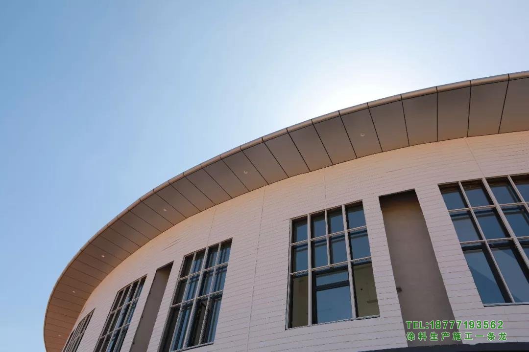 广西医科大学武鸣校区外墙真石漆由广西绿桂涂料厂包工包料实拍2